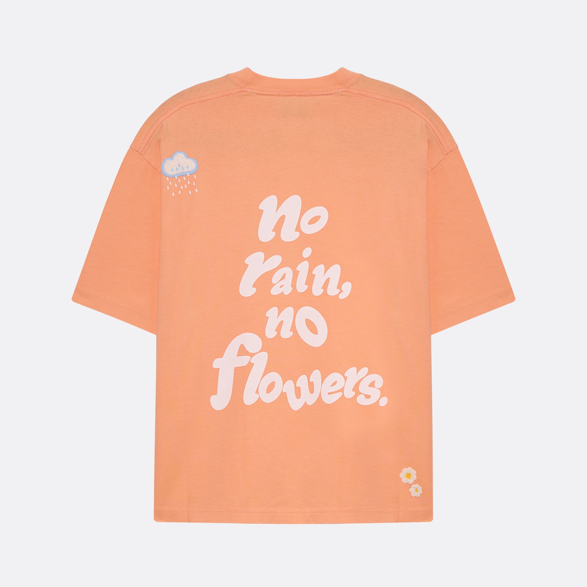 T-shirt unissexo da marca 30Fied, em tom coral. Modelo oversized de manga curta, com bordados e estampados diferenciadores. Confecionada em tecido macio, com acabamento de alta qualidade.